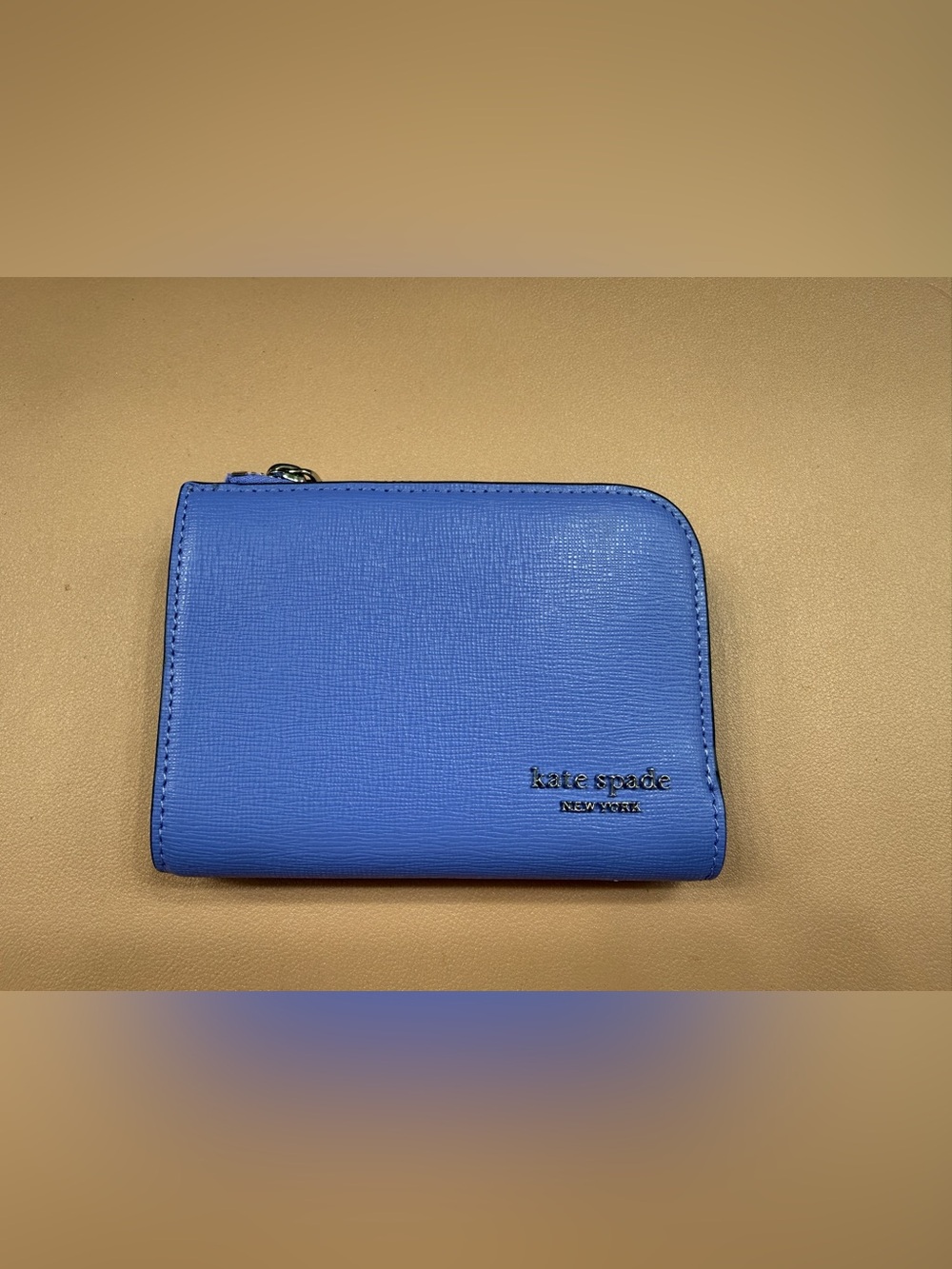 kate spade blue zip-around leather wallet